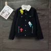 Chaqueta de mezclilla Chrome Hearts con cuello blanco y Cross Patches