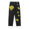 Vaqueros amarillos desgastados de Chrome Hearts