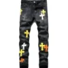 Vaqueros con el logotipo de la cruz de Chrome Hearts